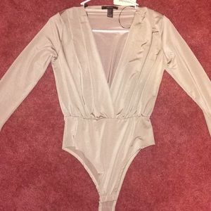 Beige silky body suit
